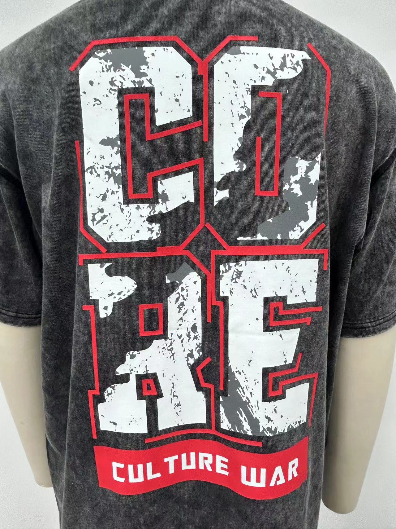 Men's black washed t-shirt a bold letter print and embroidered design