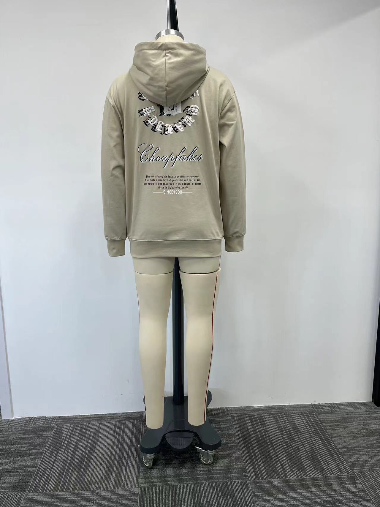 Men's hoodie features a unique yellow and grey color combination