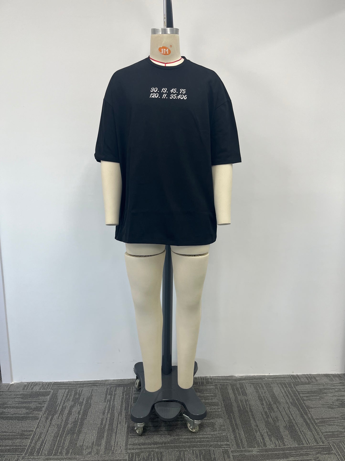 Rubber printed shirt boasts a glossy finish