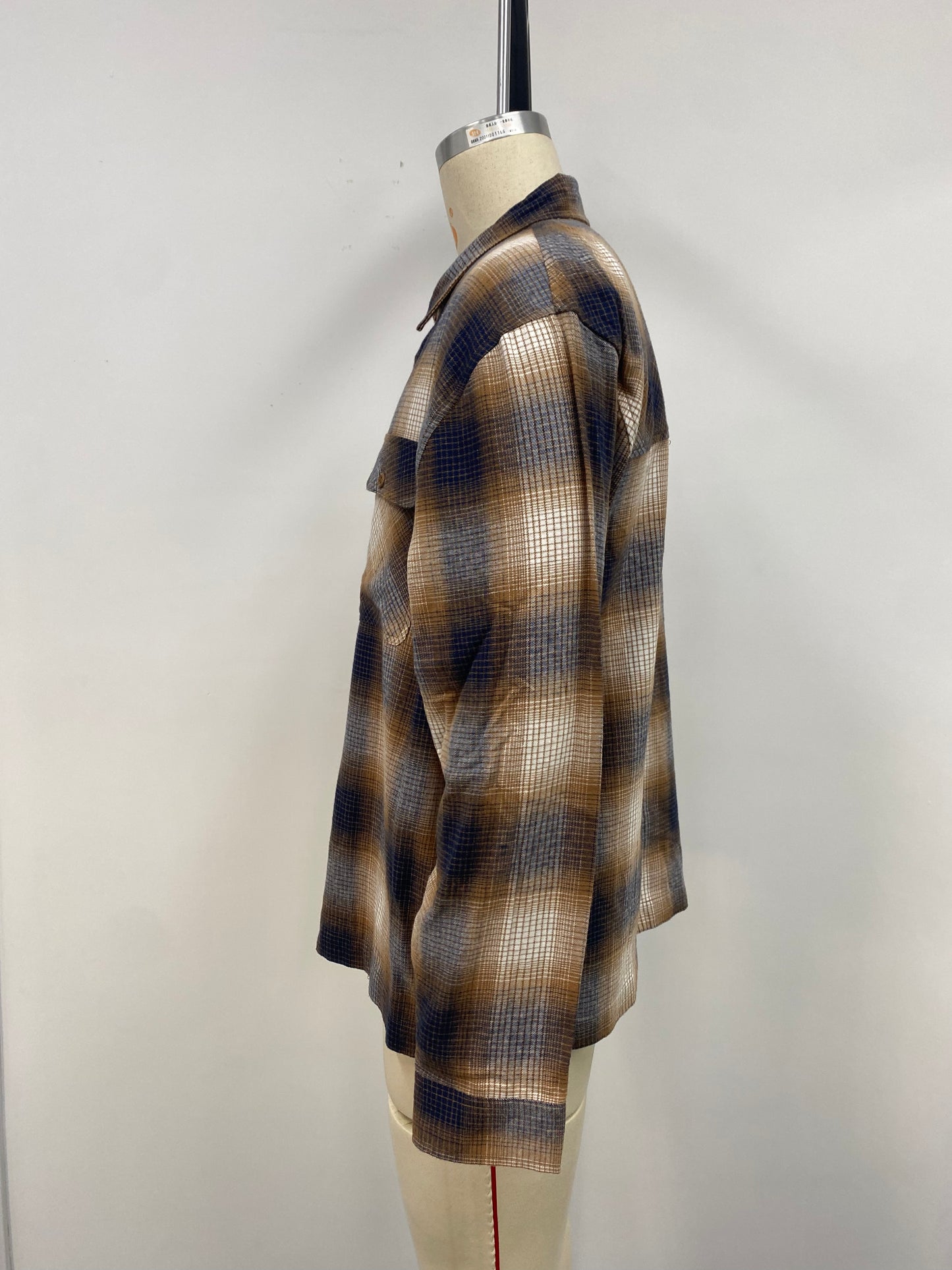 Men's shirt is a bold choice with its yellow, black, and white color scheme