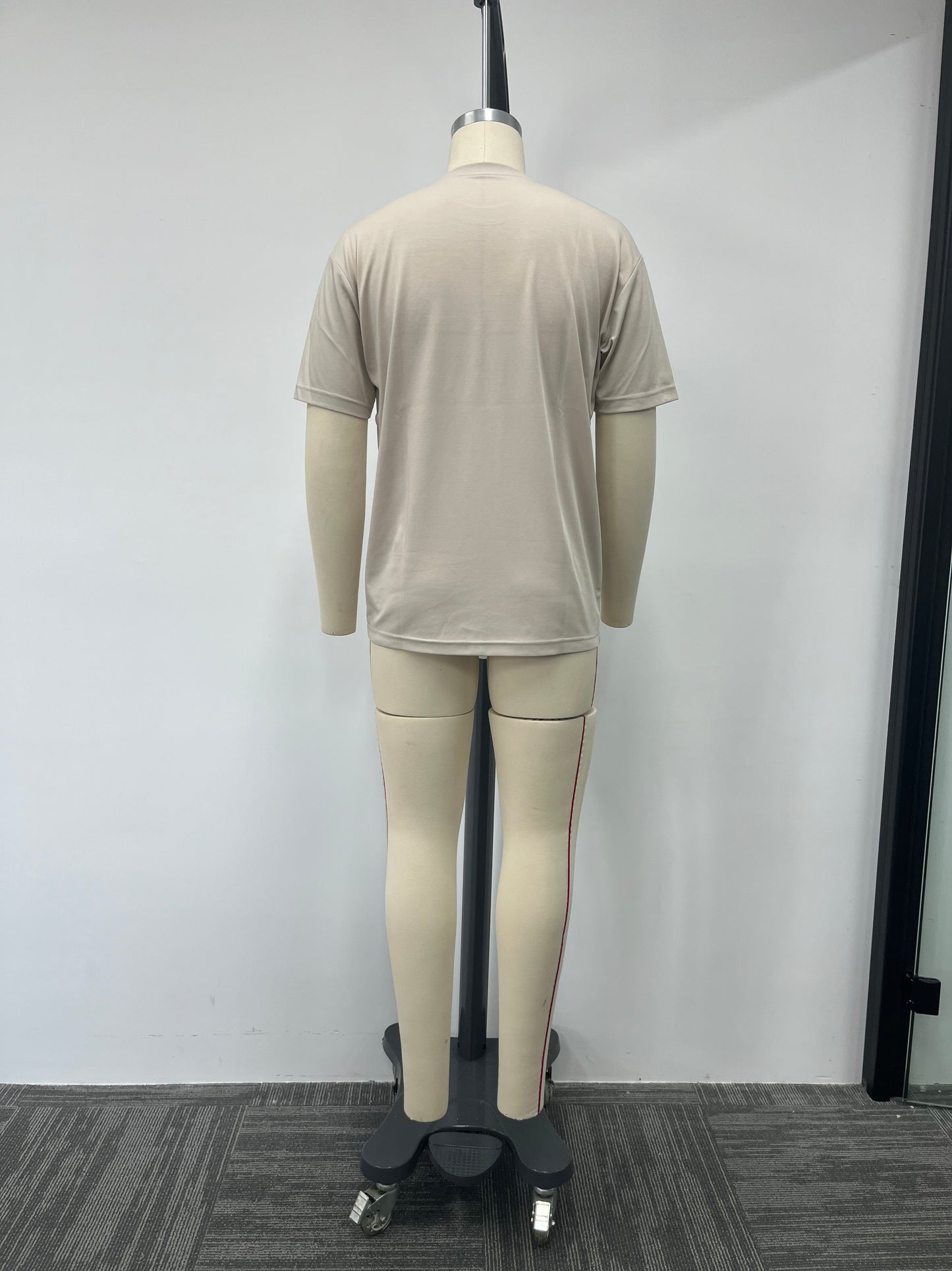 Printed T-shirt features a metallic texture