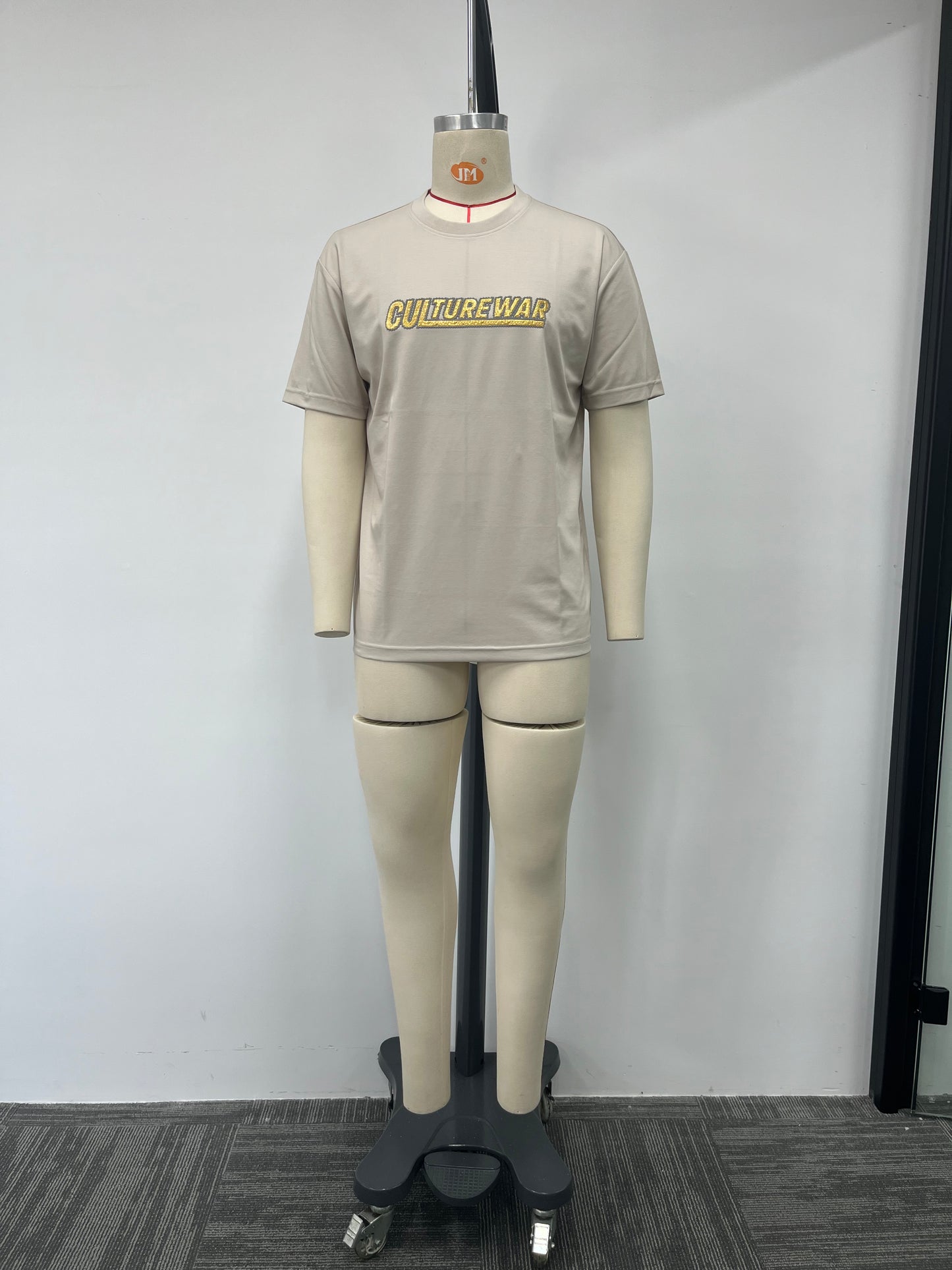 Printed T-shirt features a metallic texture