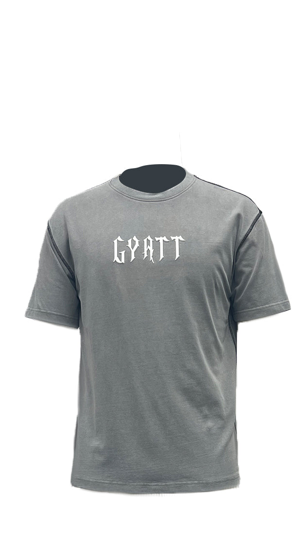 T-shirt features bold letter prints and a playful cream puff design