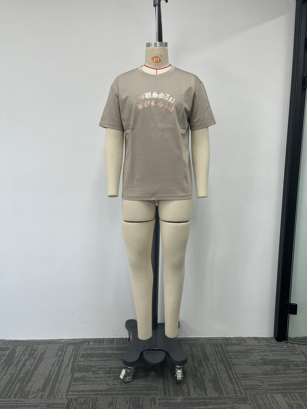 men's T-shirt features a champagne gold print