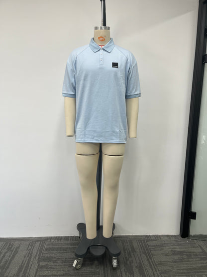 Blue polo shirt features a large number printed
