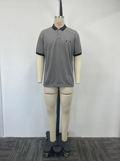 Polo shirt features a stylish combination of grey and black