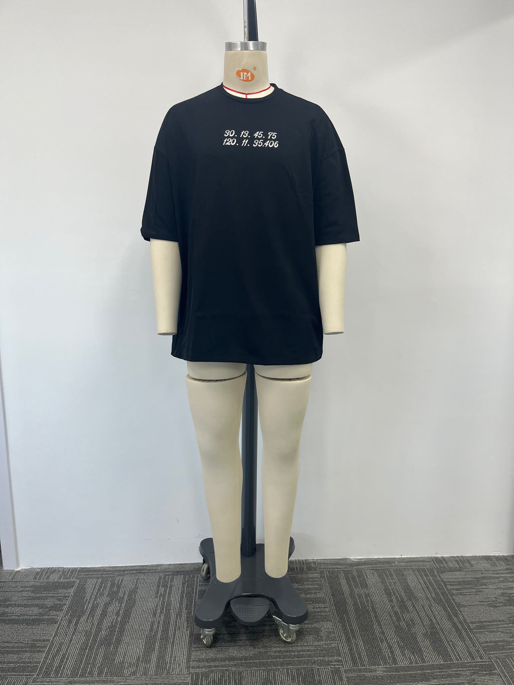 Rubber printed shirt boasts a glossy finish
