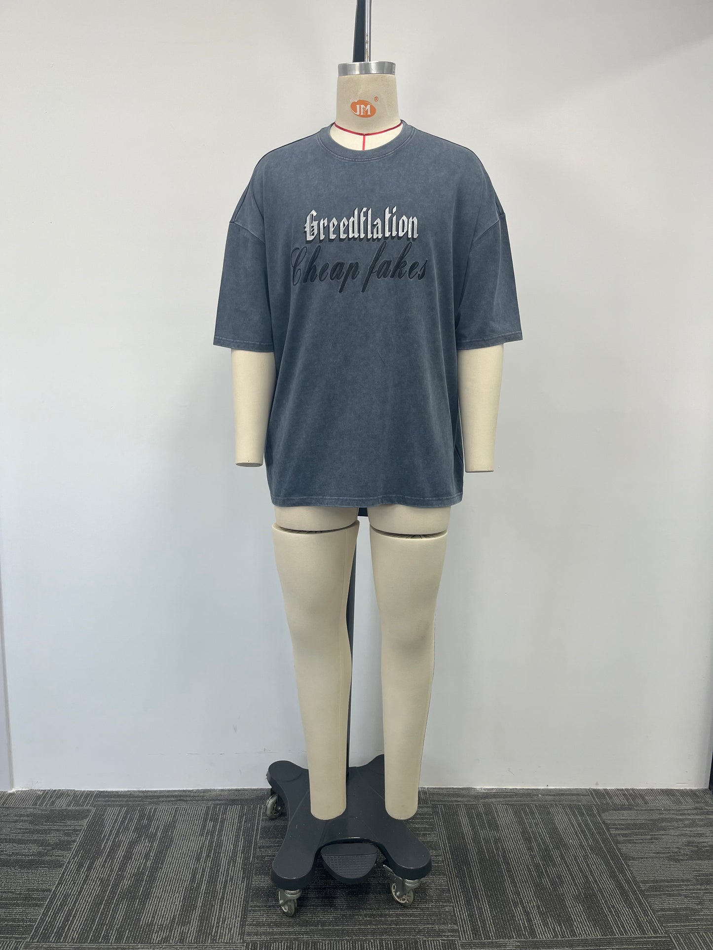 Blue-gray T-shirt features multi-process printing