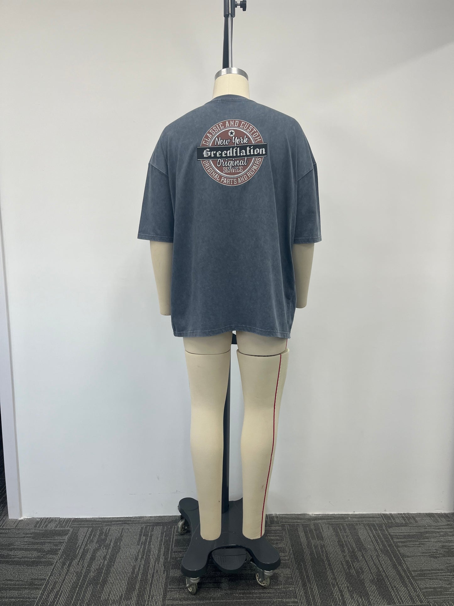 Blue-gray T-shirt features multi-process printing