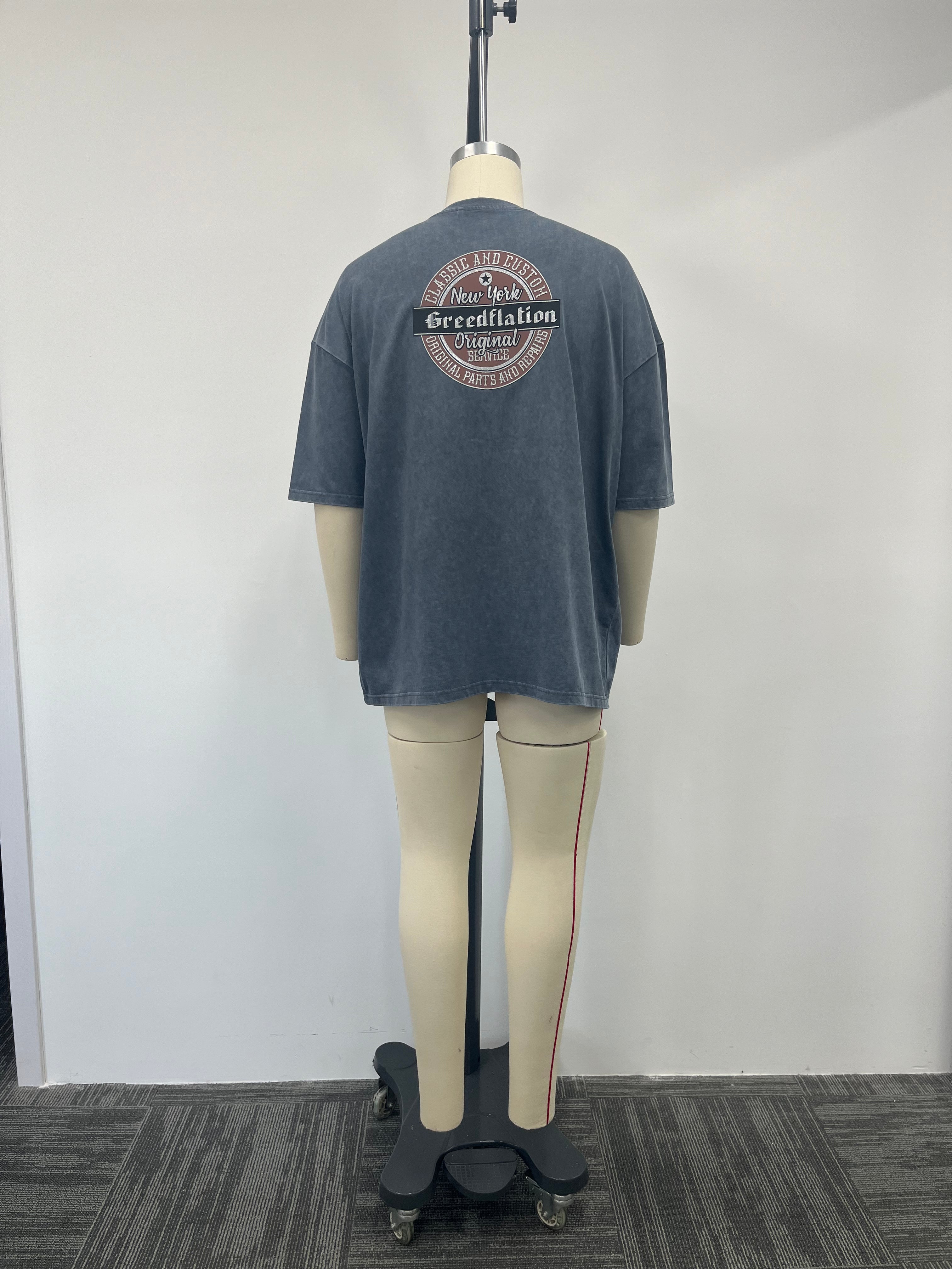 Blue-gray T-shirt features multi-process printing