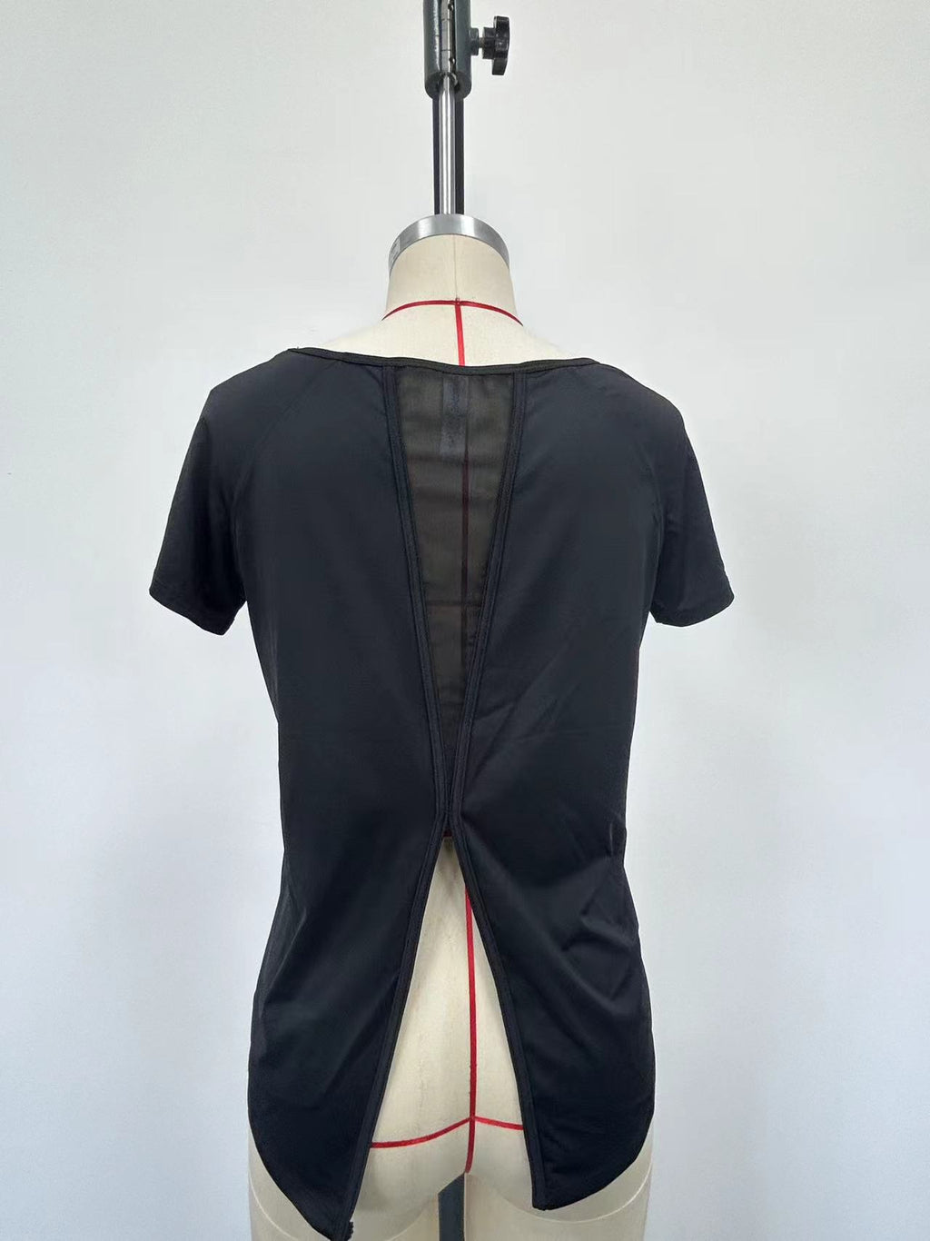 Women's black athletic short-sleeved shirt