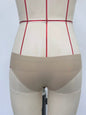 Flesh-colored swim trunks
