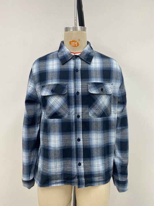 Men's grid-patterned shirt in black and white with blue accents