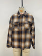 Men's shirt is a bold choice with its yellow, black, and white color scheme