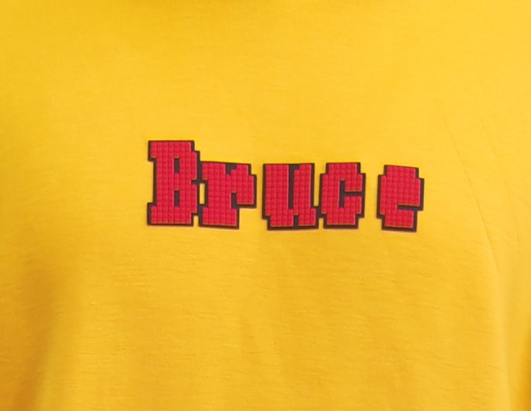 Bruce Lee’s color-coordinated men's sweatshirt and pants set with letter prints