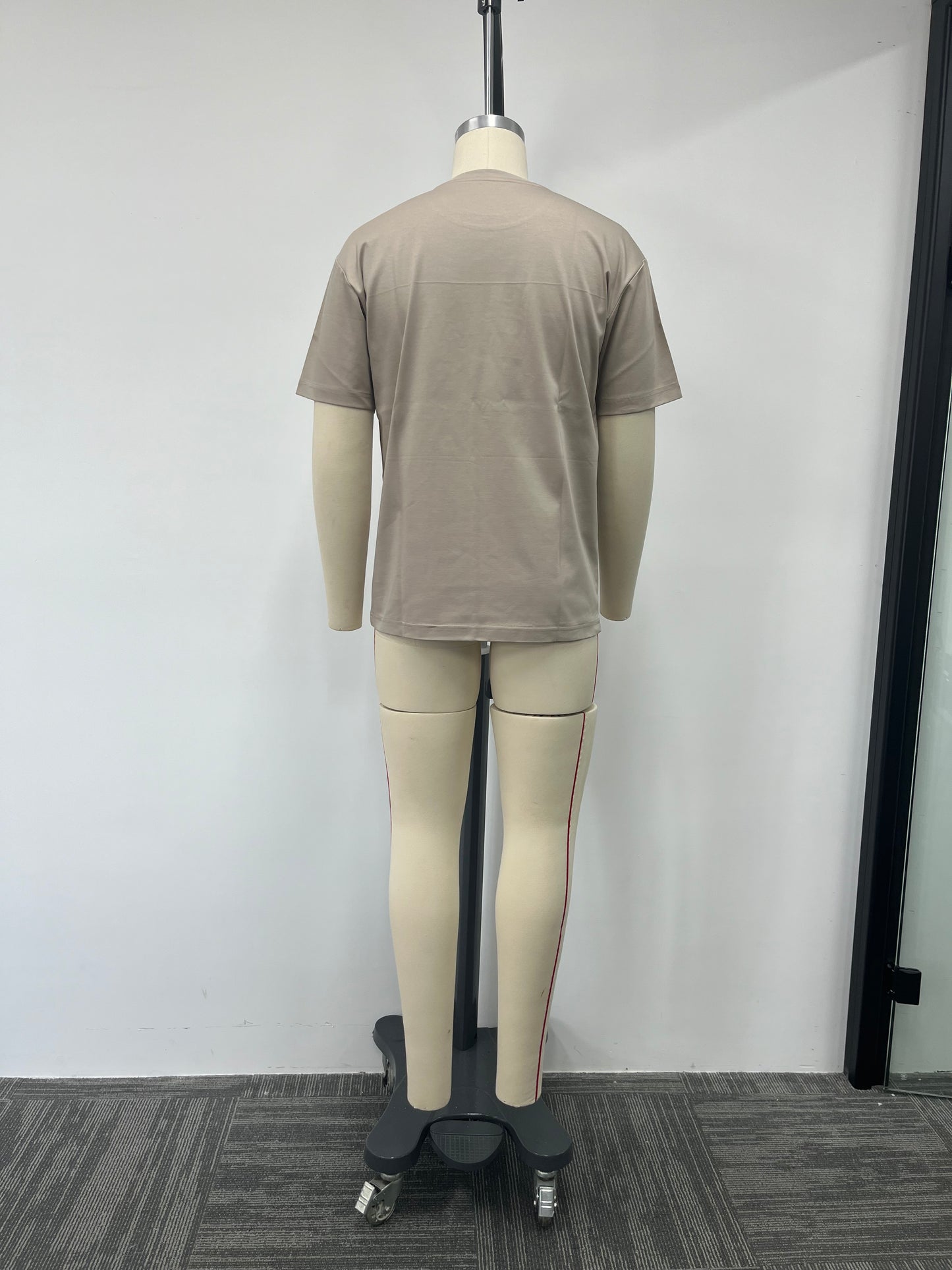 men's T-shirt features a champagne gold print