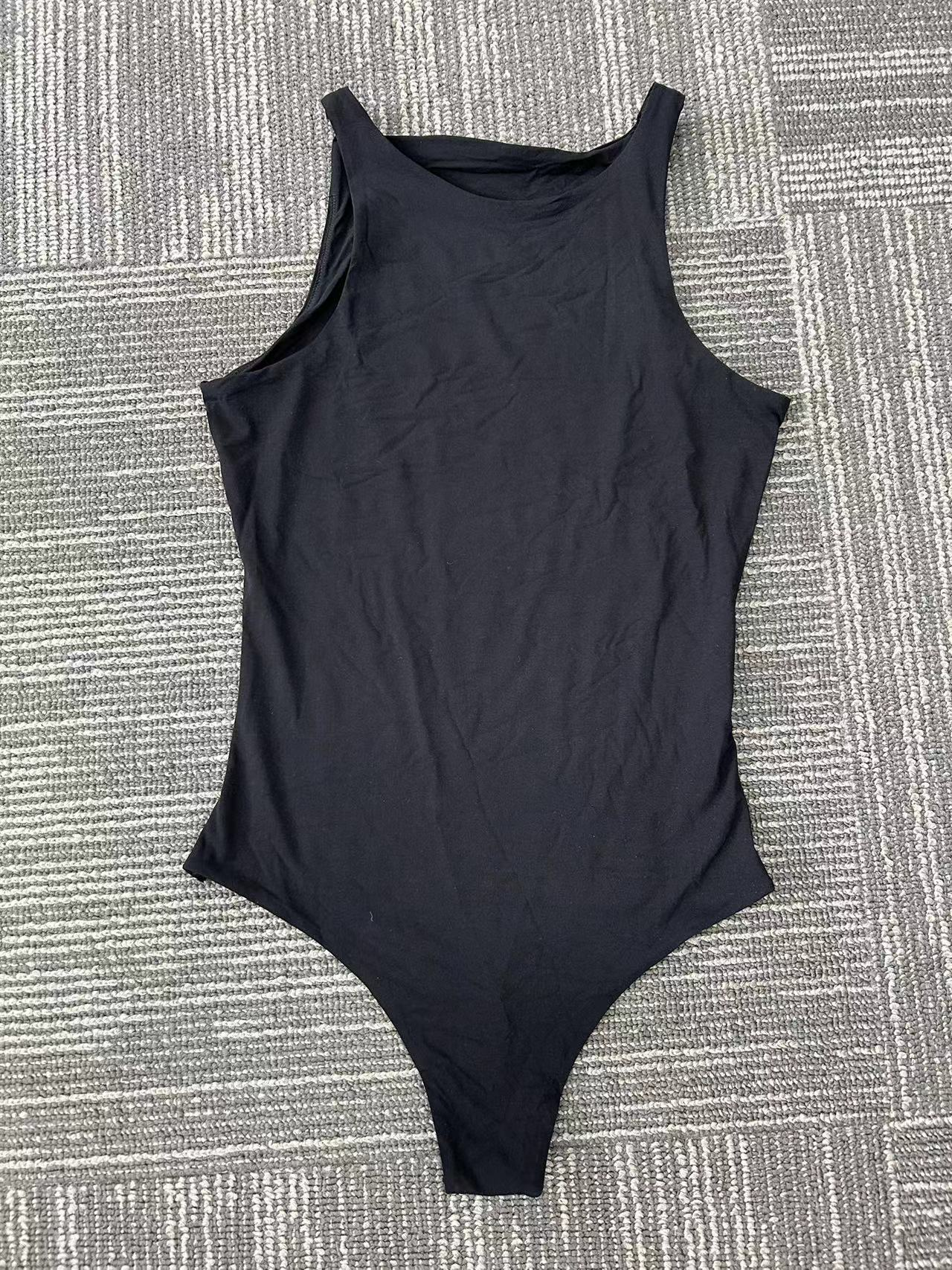 Black sleeveless one-piece swimsuit