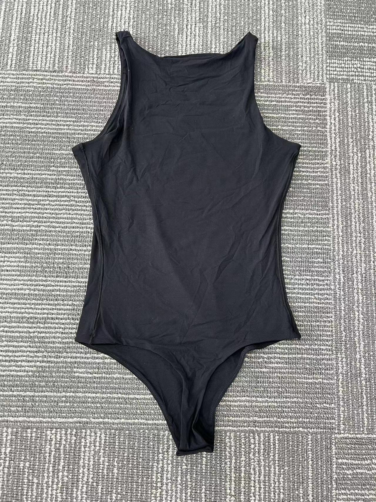 Black sleeveless one-piece swimsuit