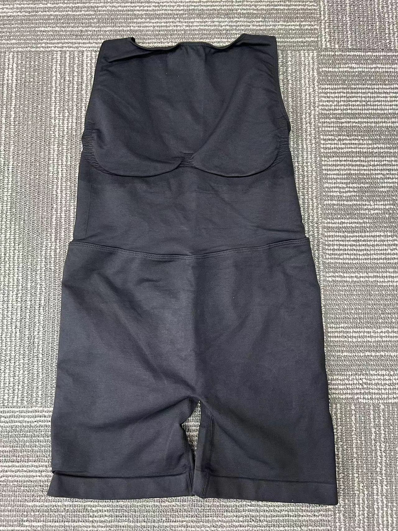 Black, form-fitting tummy control pants
