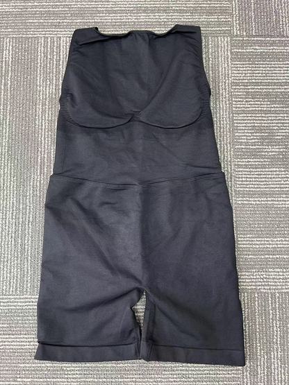 Black, form-fitting tummy control pants
