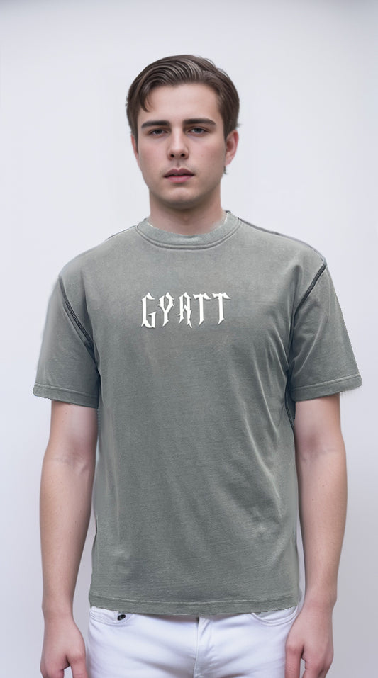 T-shirt features bold letter prints and a playful cream puff design