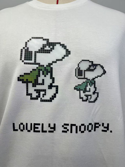 White T-shirt with a Lego-style cartoon pattern print
