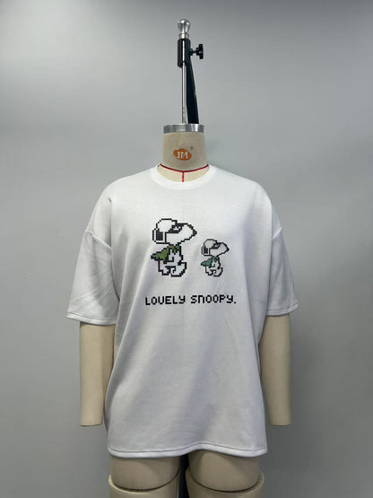 White T-shirt with a Lego-style cartoon pattern print