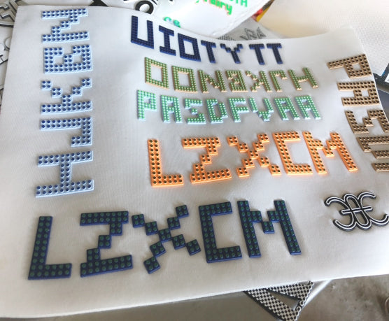 Men's t-shirt features a unique LEGO-inspired alphabet print