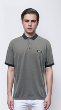 Polo shirt features a striking contrast of gray and black
