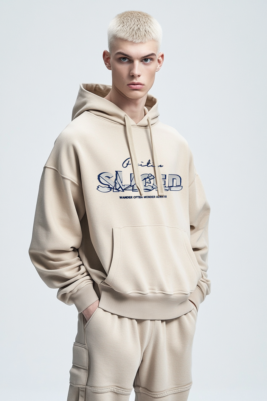 Men's beige hoodie features a silver metallic print