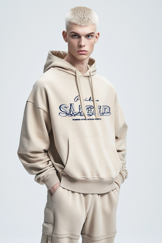 Men's beige hoodie features a silver metallic print