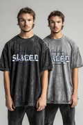 Men's water-washed faded T-shirt features a silver metallic print