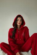 Red zip-up hoodie set features a festive Christmas tree print
