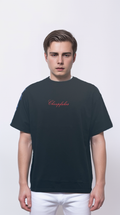 Black T-shirt features a large embroidered patch on the back